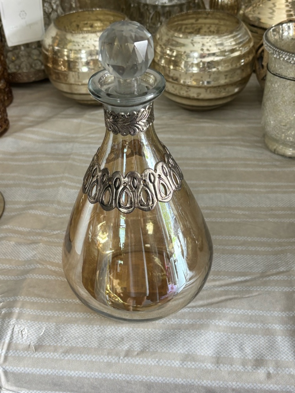 Decorative Amber Glass Bottle Decanter with Bronze Accent
